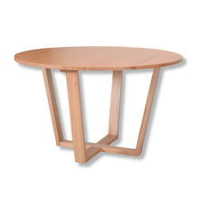 Monti round messmate timber dining table with solid base on a plain background