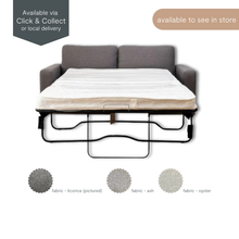 Riley Double Sofa Bed in licorice fabric, folded out to reveal double mattress and metal frame.