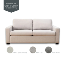 Riley Double Sofa Bed in light oyster fabric with soft cushioning and minimalist armrests.