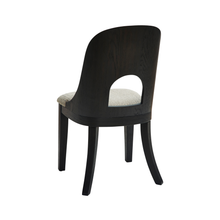 Rear view of Rowenbeck dining chair with signature cut-out back design – Ashley Furniture at Caesars Griffith