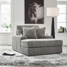Lindyn Oversized Chaise in Fog fabric styled in living room – available at Caesars Griffith.