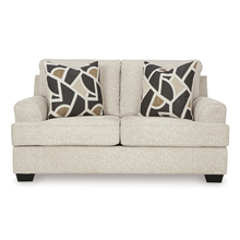 Front studio view of the Heartcort Quartz 2-seater sofa showing plush seat cushions, tapered arms and neutral Quartz fabric finish.