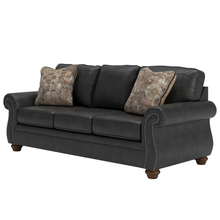 Angled view highlighting classic lines and detailed stitching on Shadsburne 3 seater sofa.