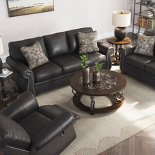 Shadsburne lounge suite with marble top tables and decorative cushions in classic Earth Granite finish.