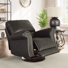 Shadsburne swivel glider recliner in Earth Granite faux leather shown fully extended in lounge setting.