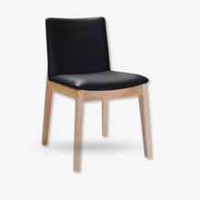 Bonny dining chair in black leather with timber legs