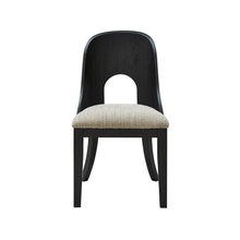 Front view of Rowenbeck dining chair featuring curved black frame and soft textured seat – Ashley Furniture at Caesars Griffith