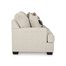 Side profile of Heartcort Quartz 3-seater sofa showing smooth curves and timber-look legs.