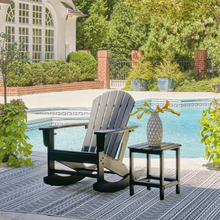 Black Sundown Treasure rocking chairs by the pool – stylish outdoor comfort from Caesars Furniture Griffith NSW.