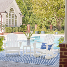 White Sundown Treasure rocking chair styled poolside – fresh coastal look from Caesars Furniture Griffith.